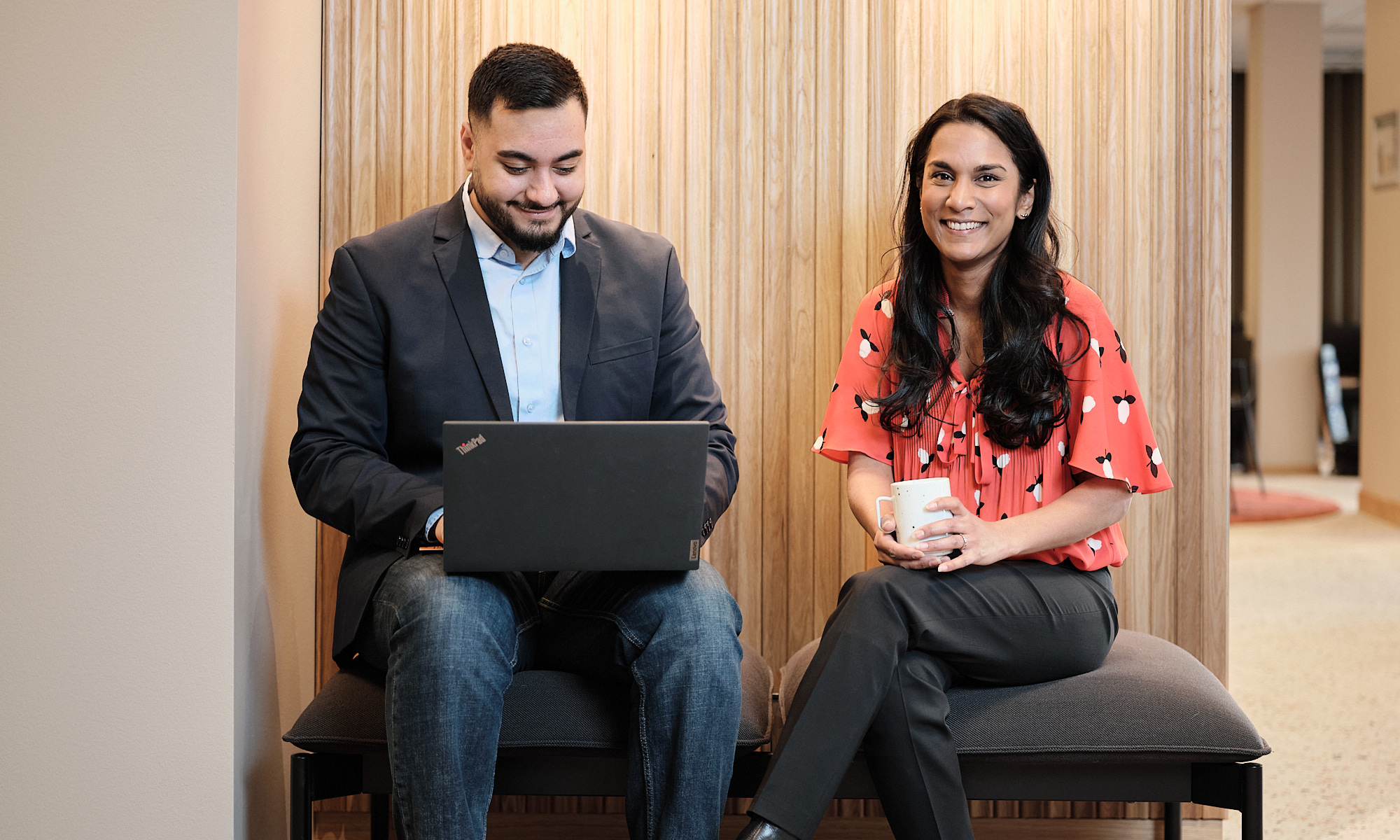 A women and a man in the office 