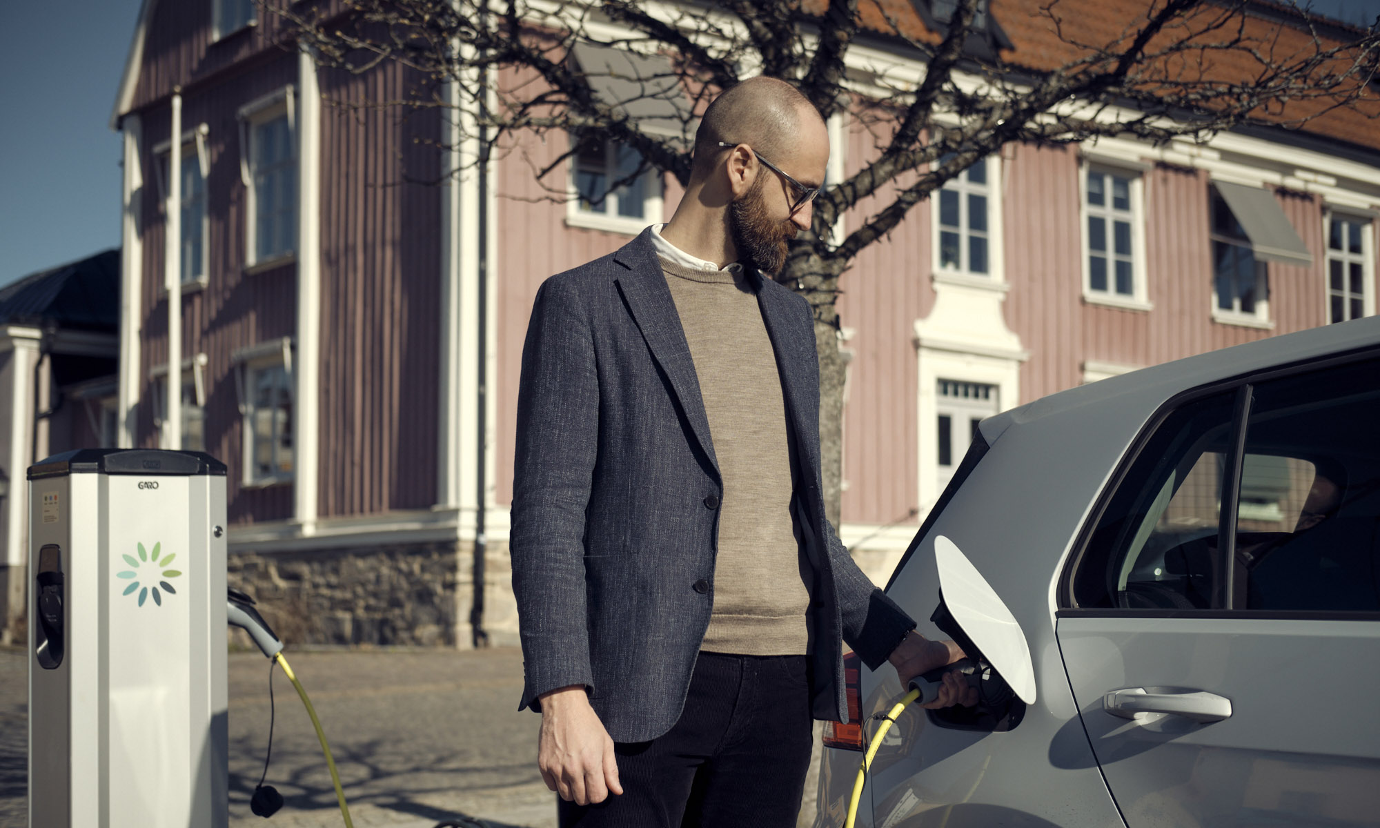 Gabriel with an electric car