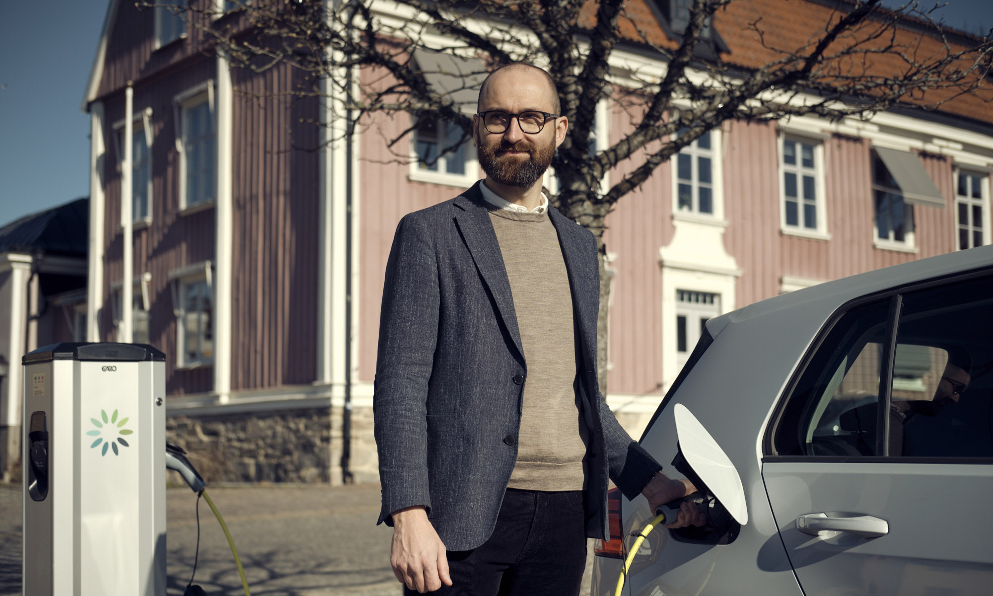 Gabriel with an electric car